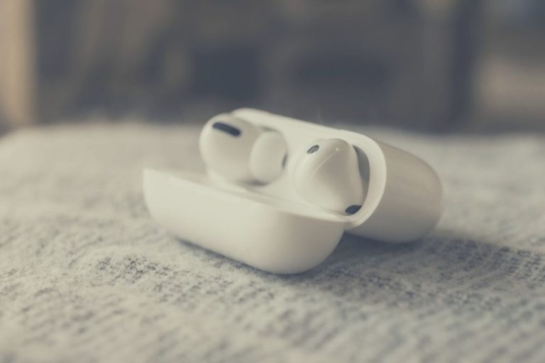 AirPod Pros on a grey surface