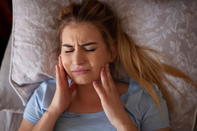 Woman dealing with TMJ issues